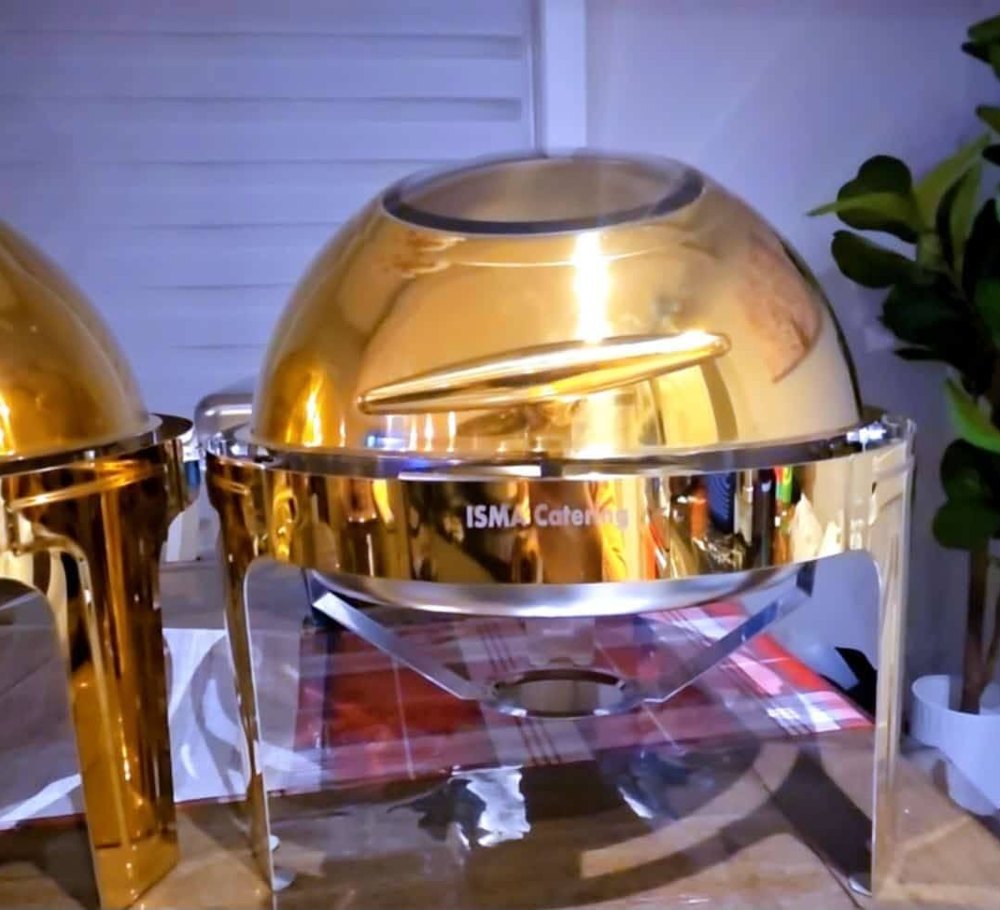 Gold round chafing dish with a glass-top lid